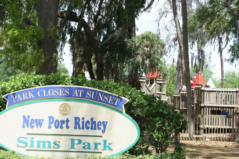 The Sims Park entrance sign and playground in downtown New Port Richey