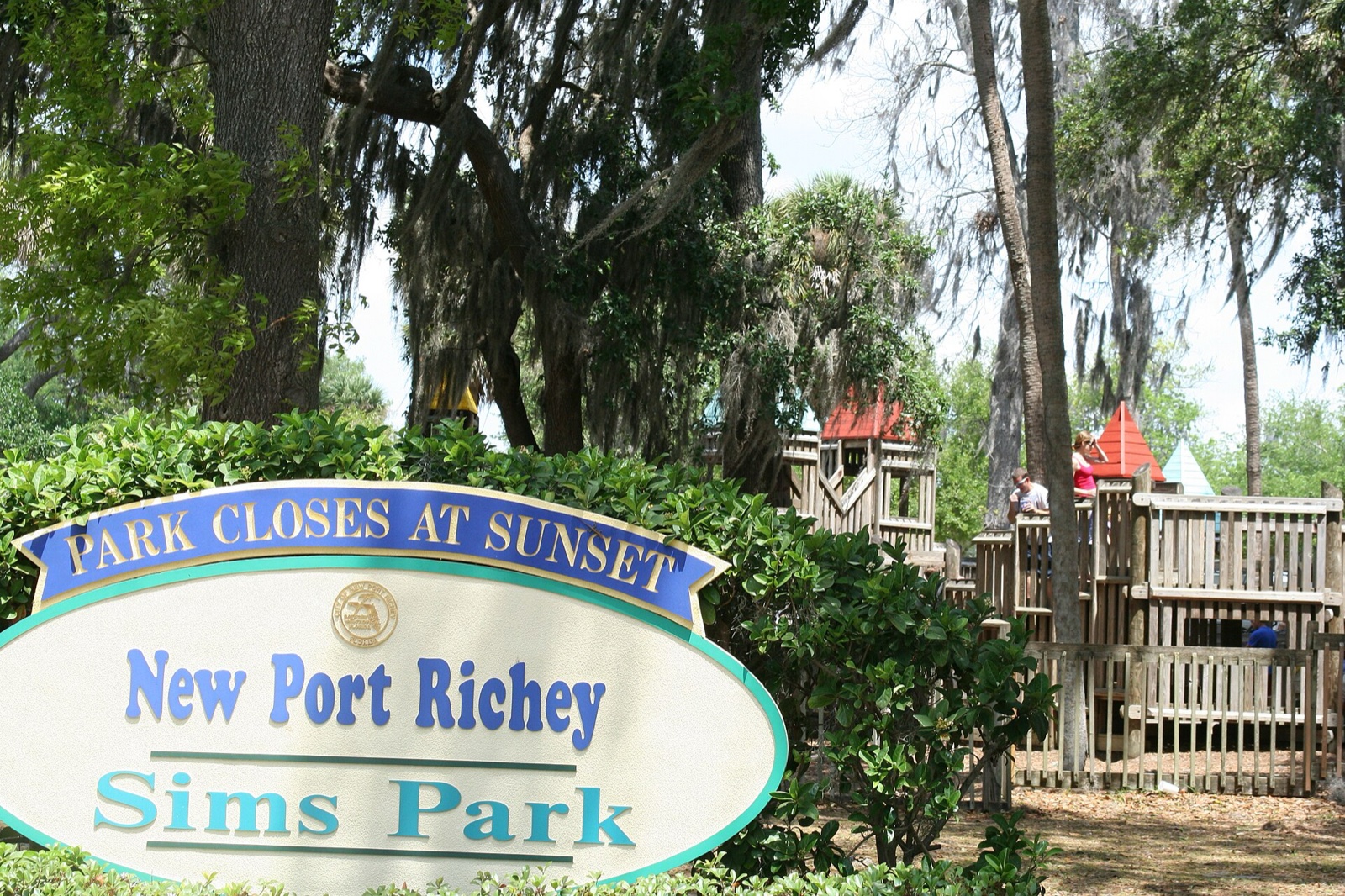 The Sims Park entrance sign and playground in downtown New Port Richey
