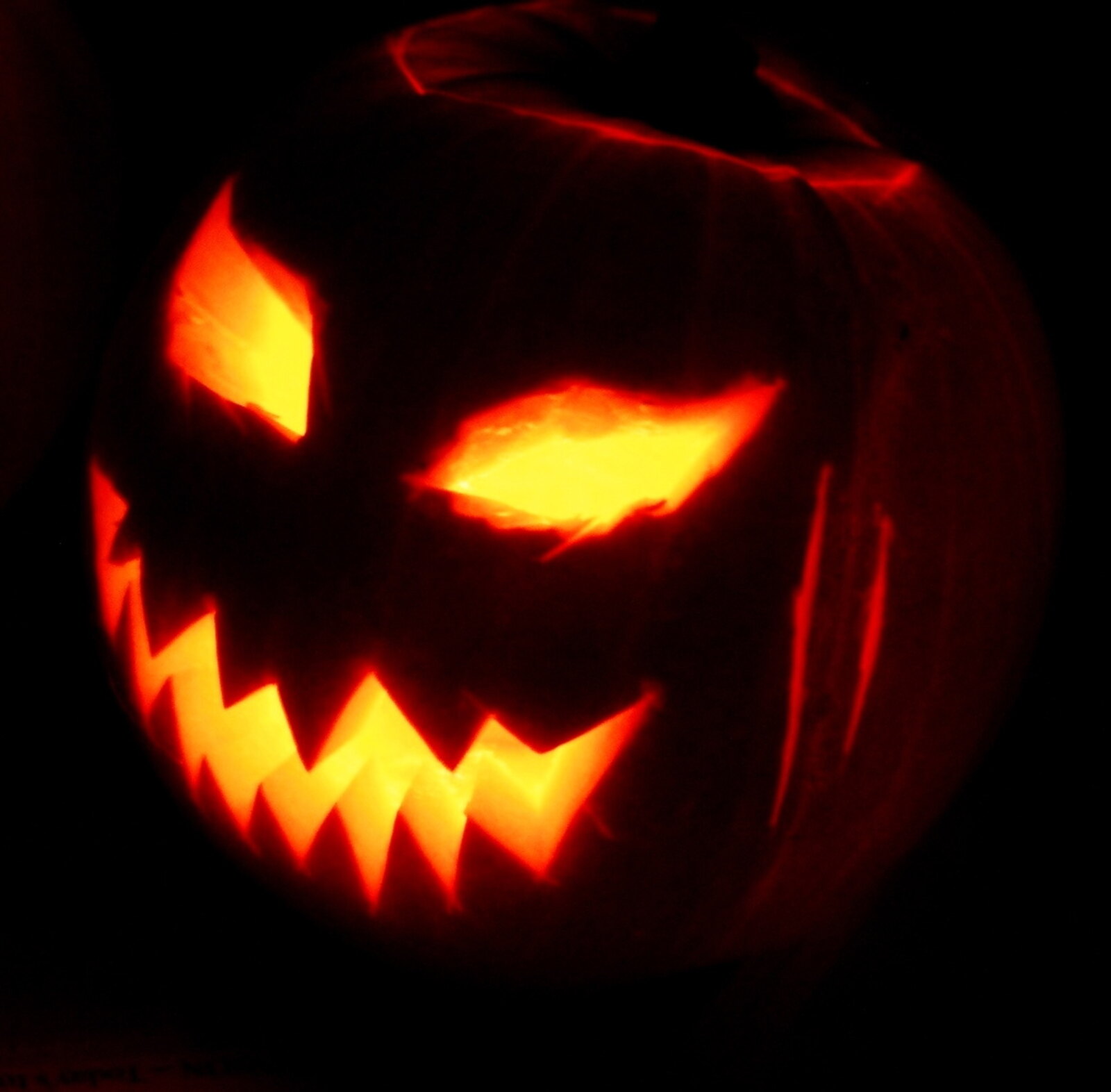 A carved jack-o-lantern pumpkin