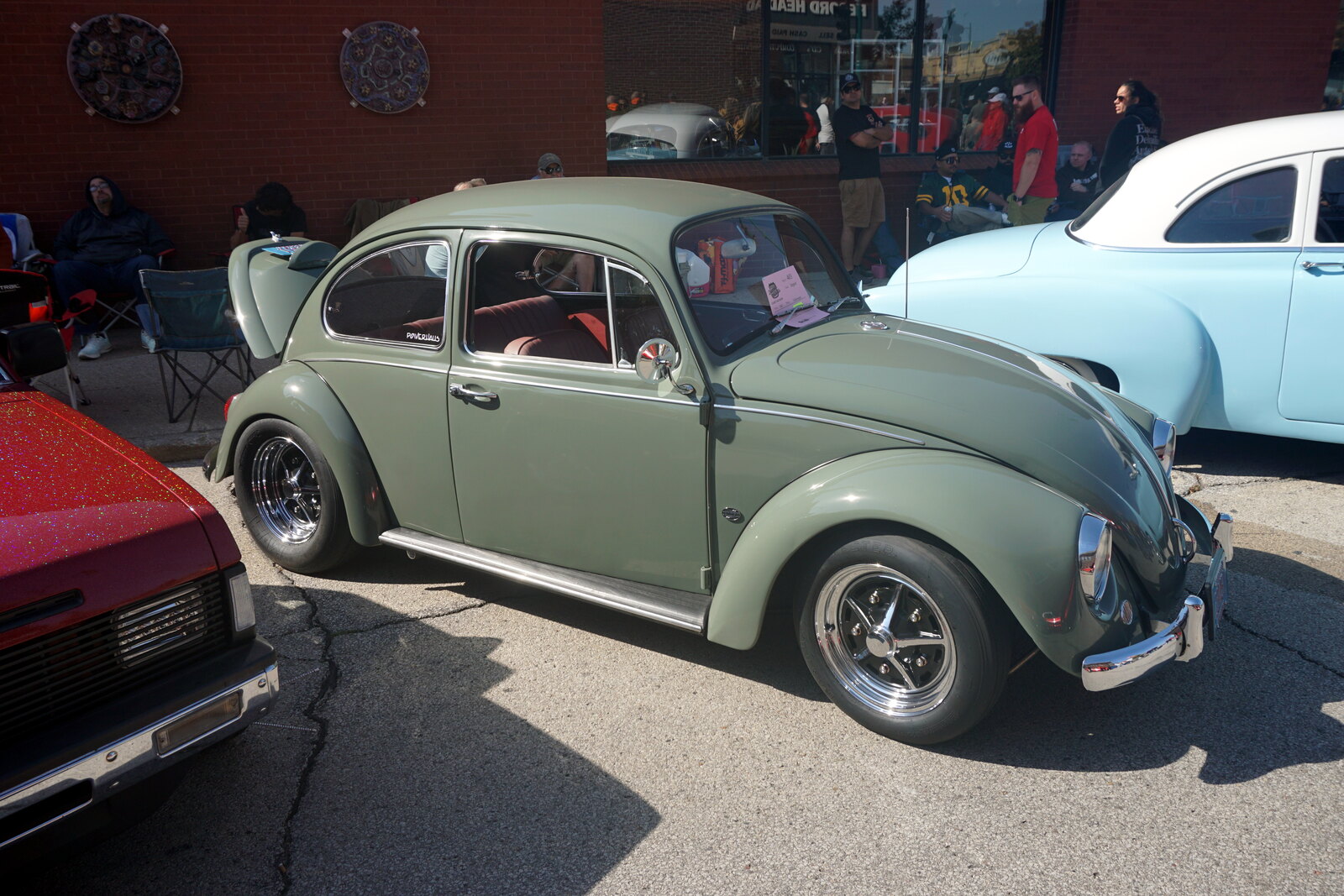 Classic Volkswagen Beetle at a car show, representative of the Florida Bug Jam